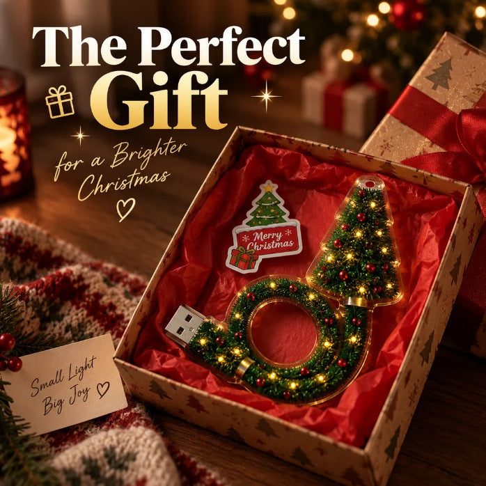 Christmas tree-shaped projection light with a flexible green neck and USB connector, displayed in a festive gift box