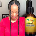 Zingiber Hair Growth Oil dropper bottle alongside a woman wearing twists